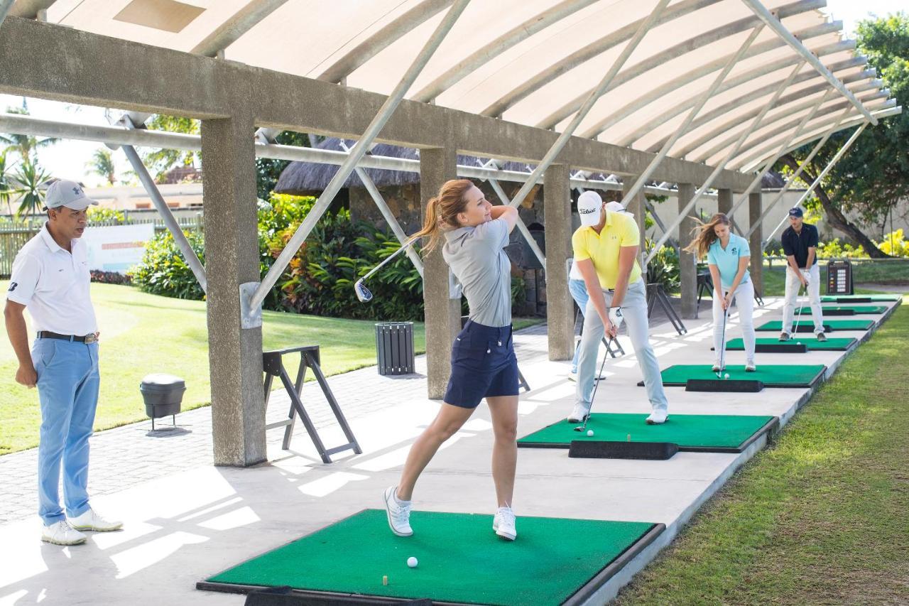 Constance Prince Maurice Poste de Flacq Kültér fotó Golfers practicing at a driving range