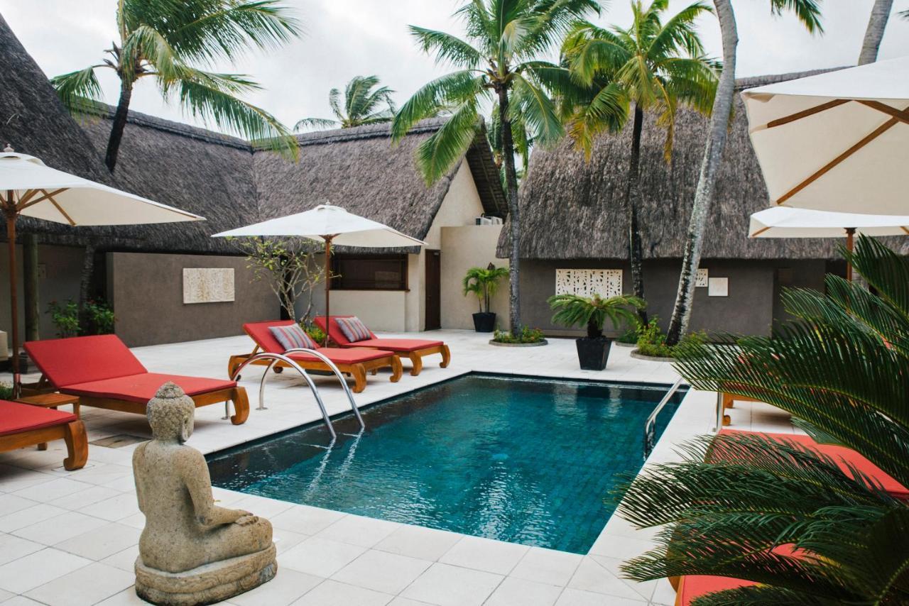 Constance Prince Maurice Poste de Flacq Kültér fotó A pool at the resort